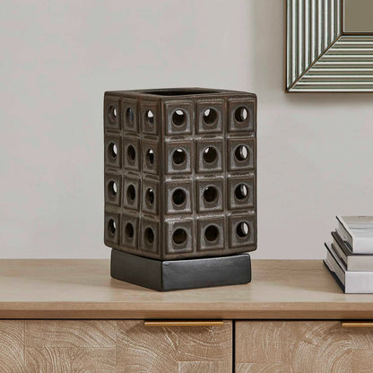 Lattice Indoor-Outdoor Lantern Candleholder by Uttermost in brown, gray and dark. Made from earthenware in a unique style.