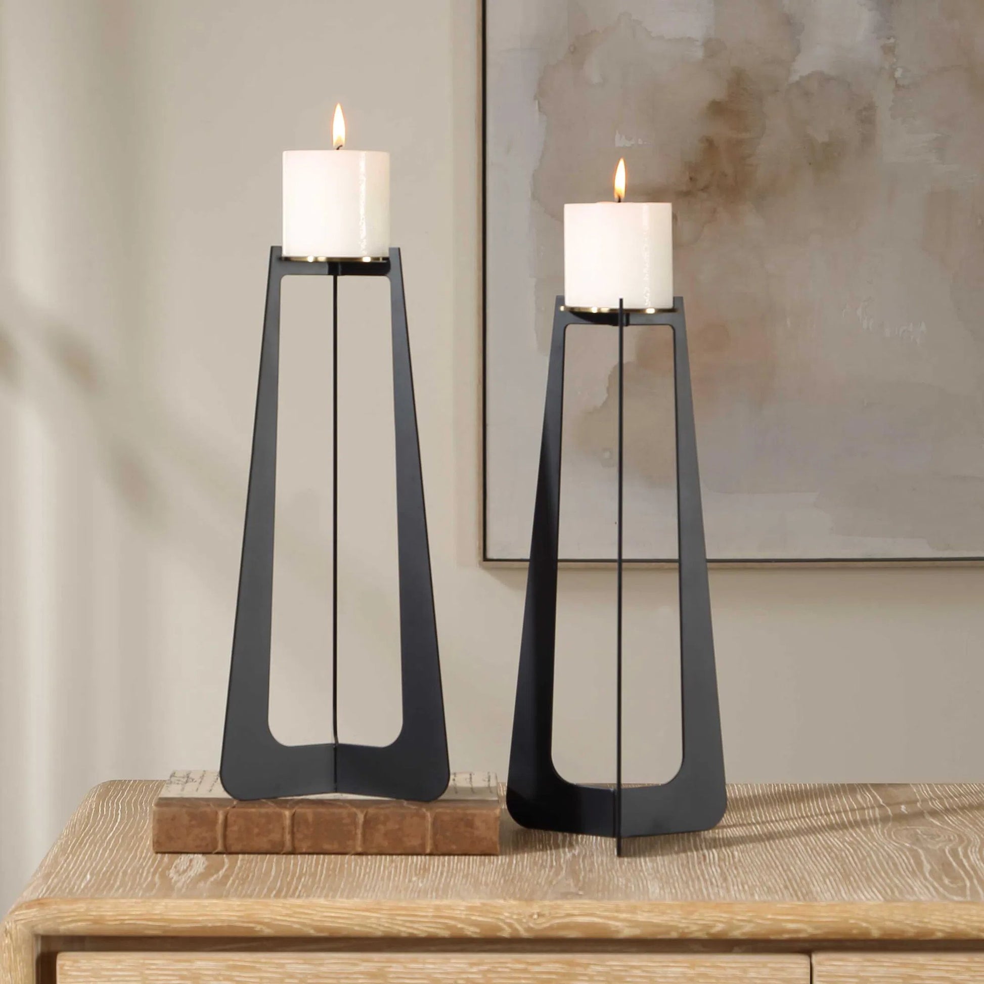 Columnar Candleholders by Uttermost in black, brass. Made from iron in a unique style.