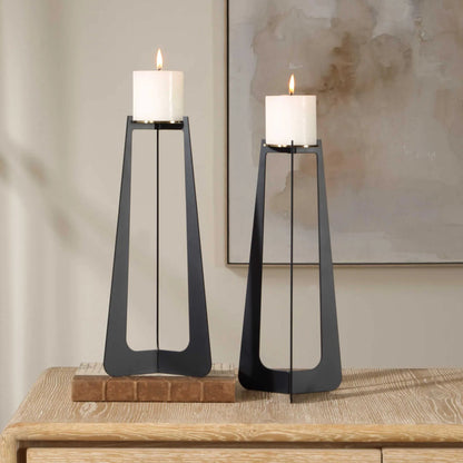 Columnar Candleholders by Uttermost in black, brass. Made from iron in a unique style.