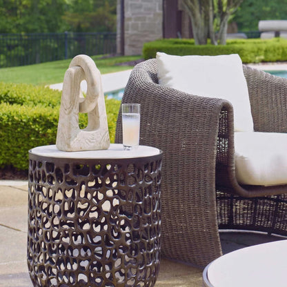 Continuum Indoor/Outdoor Sculpture by Uttermost in brown, white and stone. Made from lime stone in a unique style.