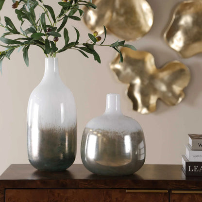 Cardoni Smoke Vases by Uttermost in bronze, white and bronze. Made from glass in a unique style.