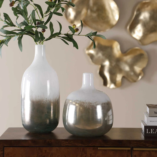 Cardoni Smoke Vases by Uttermost in bronze, white and bronze. Made from glass in a unique style.