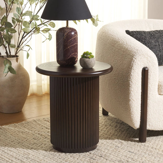 Agami Round Accent Table by Safavieh in dark brown and nc painting. Made from mdf with ash veneer in a unique style.