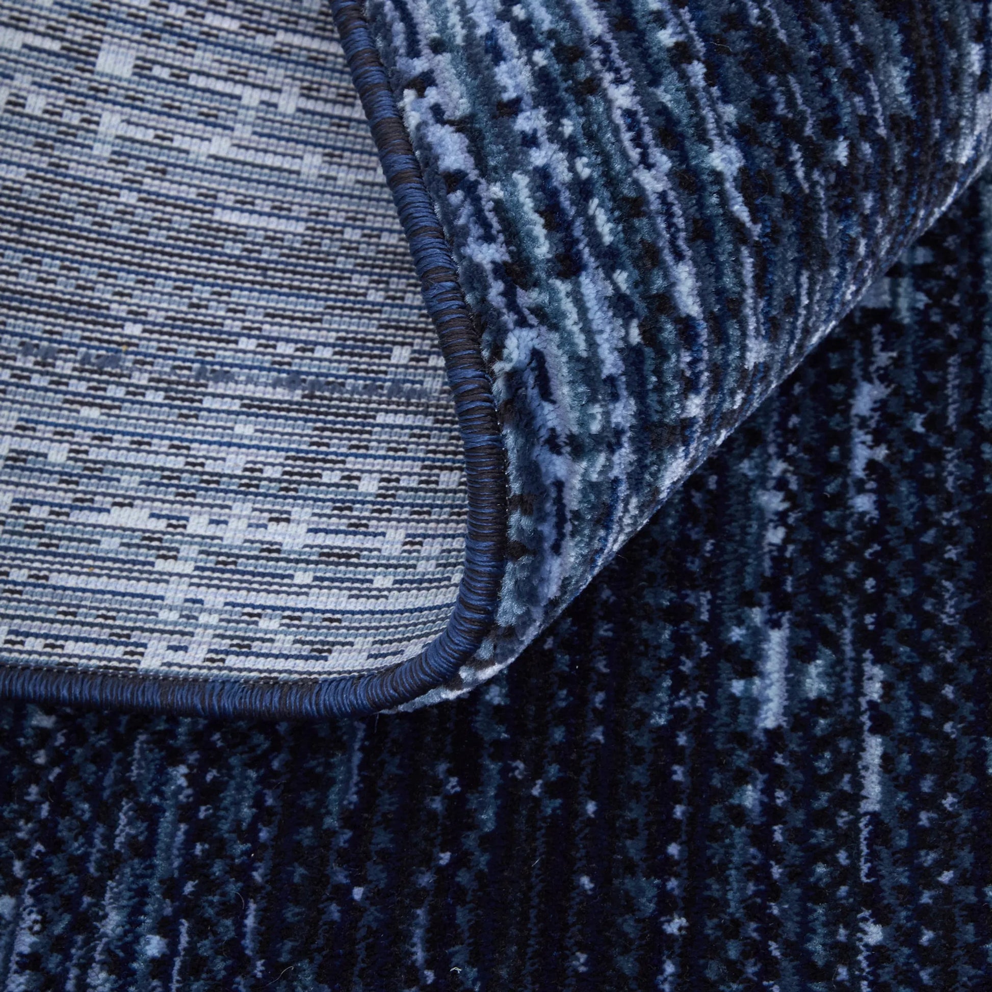 Deja Solid Rug - DJA39PJF by Feizy. Made from polypropylene, polyester in a unique style.