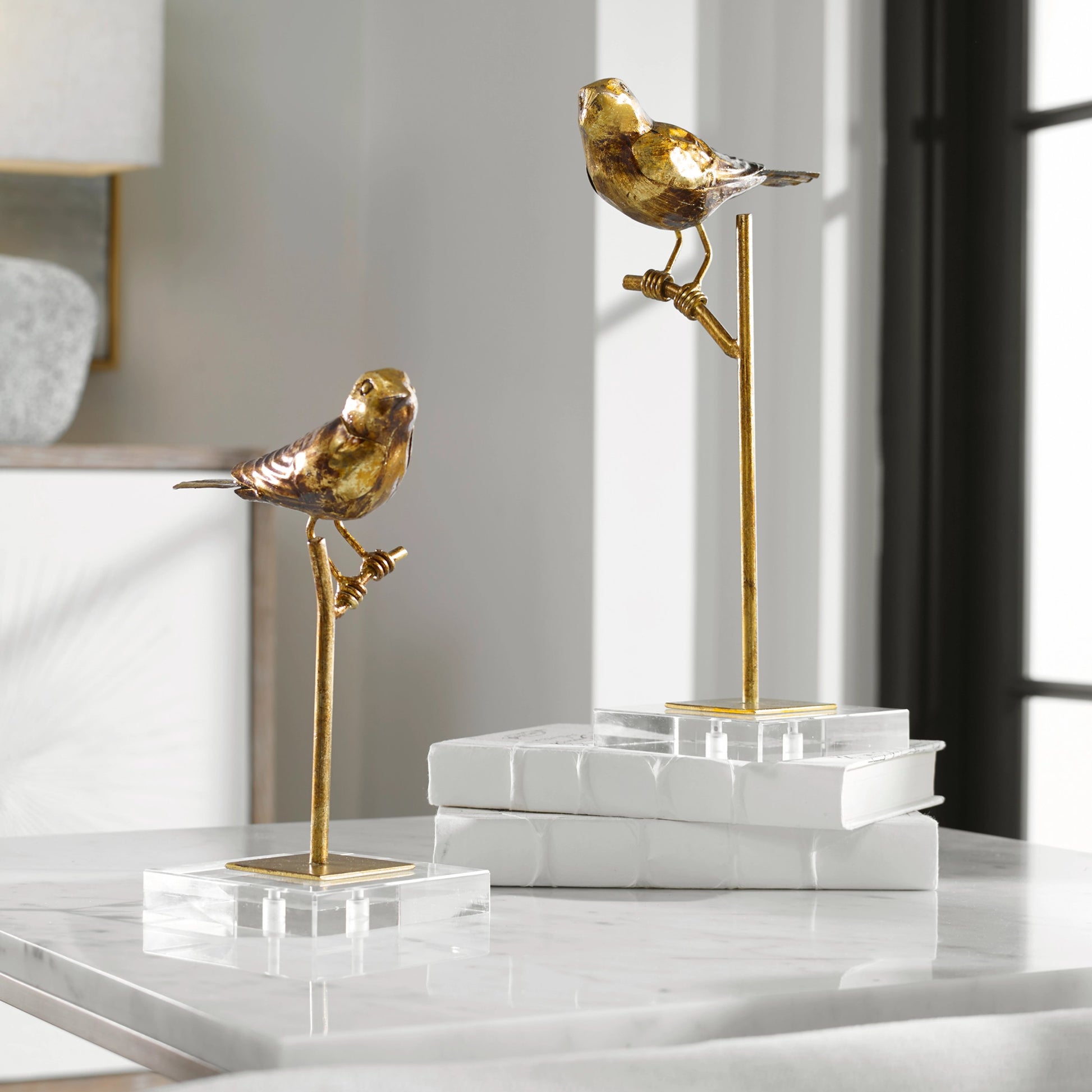 Passerines Bird Sculptures (Set of 2) by Uttermost. Made from polyresin, iron, crystal in a cottage & farmhouse style.