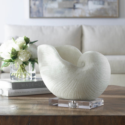 Nautilus Shell Sculpture by Uttermost. Made from polyester, crystal in a coastal style.