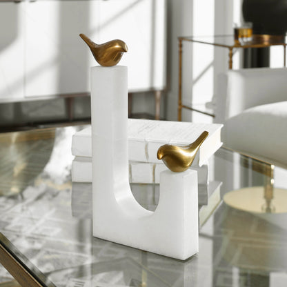 Songbirds Brass Sculpture by Uttermost in white, brushed brass. Made from brass, marble in a modern style.