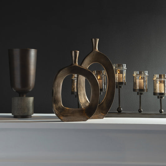 Kyler Vases by Uttermost in bronze. Made from aluminum in a eclectic & global style.