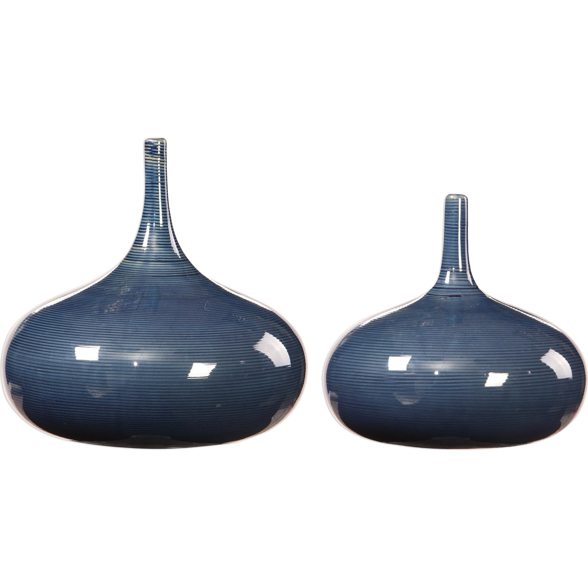 Zayan Blue Vases by Uttermost in blue. Made from ceramic in a transitional style.