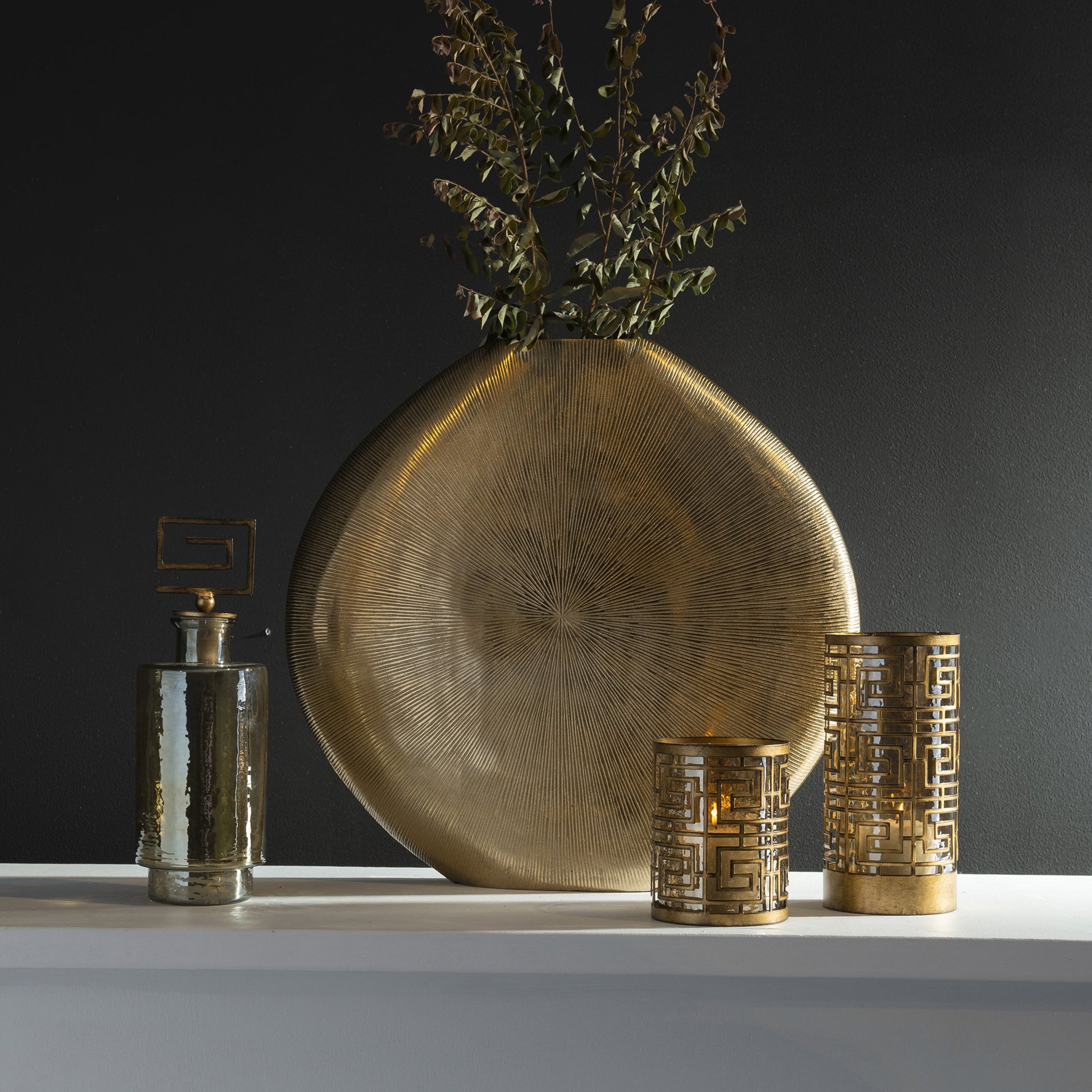 Gretchen Vase by Uttermost in gold. Made from aluminum in a eclectic & global style.