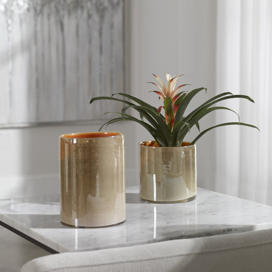 Tangelo Vases by Uttermost in orange. Made from glass in a eclectic & global style.