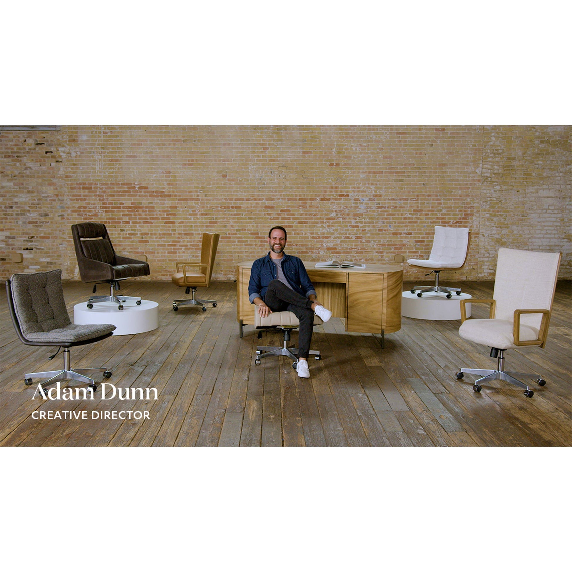 Quinn Desk Chair by Four Hands in polished nickel, dover crescent, chaps saddle and chaps saddle. Made from aluminum, 71% viscose (rayon), 17% polyester, 12% flax, linen, top grain leather in a modern style.