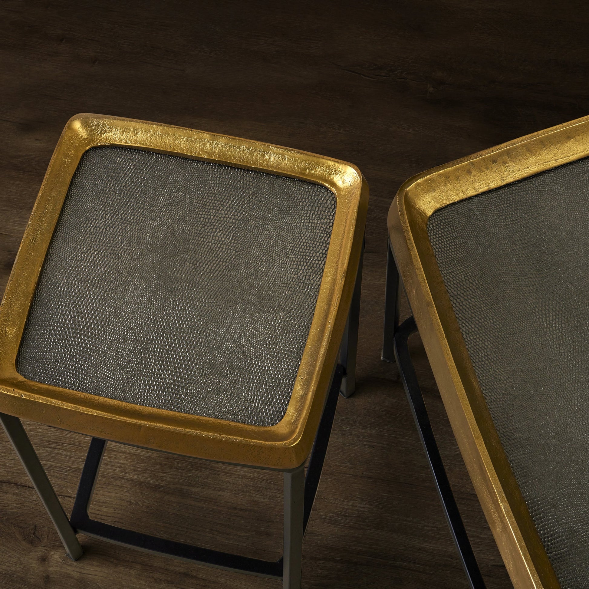 Tanay Side Table by Currey and Company in antique brass, graphite, black. Made from cast aluminum, iron in a transitional style.