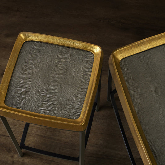 Tanay Side Table by Currey and Company in antique brass, graphite, black. Made from cast aluminum, iron in a transitional style.
