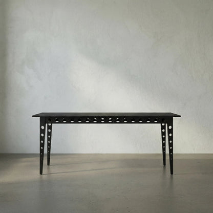 Pericles Table by Noir in charcoal black. Made from sungkai and veneer in a modern style.