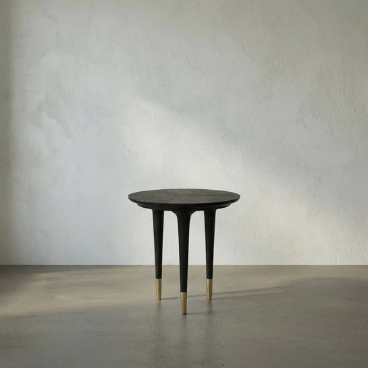 Maganini Side Table by Noir in charcoal black. Made from sungkai and brass caps in a modern style.