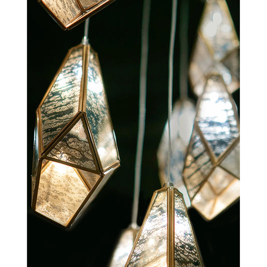 Glace Linear Pendant by Currey and Company in painted silver, antique brass. Made from brass in a modern style.