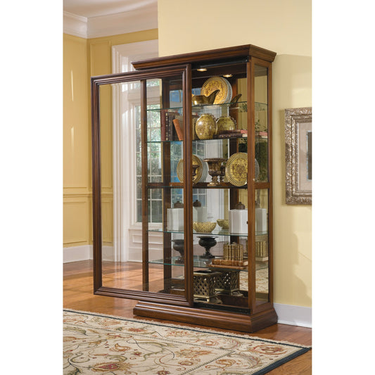 43'' Wide Hardwood Two Way Sliding Door Curio Cabinet in Rich Brown by Pulaski Furniture in rich brown. Made from poplar solids with birch veneers in a traditional style.