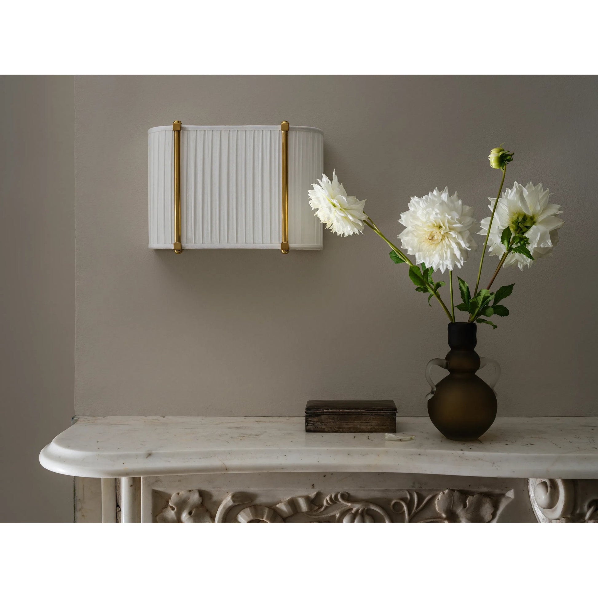 Cornell Wall Sconce by Hudson Valley in aged brass. Made from unique in a transitional style.