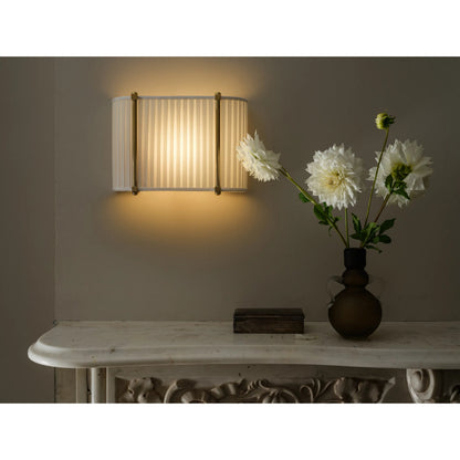 Cornell Wall Sconce by Hudson Valley in aged brass. Made from unique in a transitional style.