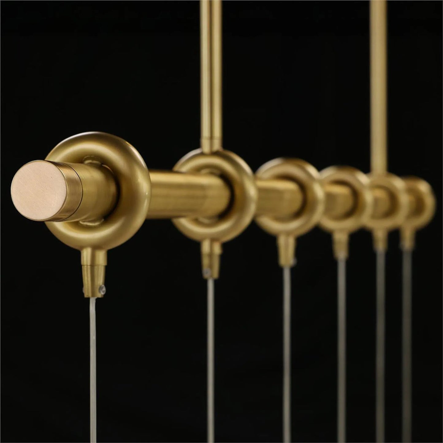 003 SI-2373593 | Closeup | Mirelle Six-Light Horizontal Chandelier by John-Richard in antique brass. Made from unique in a modern style.