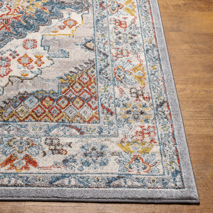 Ankara Rug by Livabliss in gray, taupe, ice blue, dark blue, cream, rust. Made from polypropylene in a unique style.