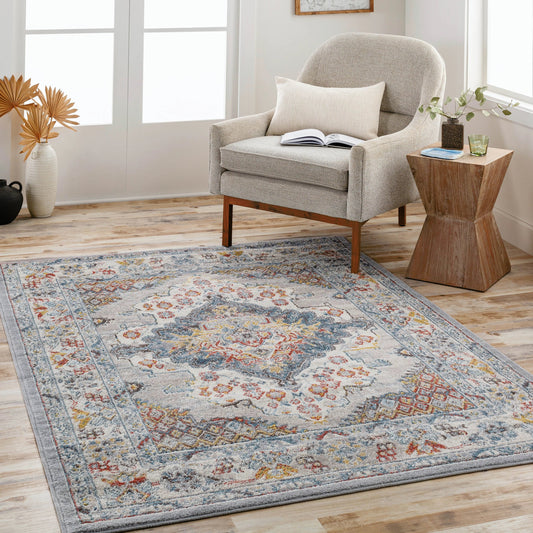 Ankara Rug by Livabliss in gray, taupe, ice blue, dark blue, cream, rust. Made from polypropylene in a unique style.