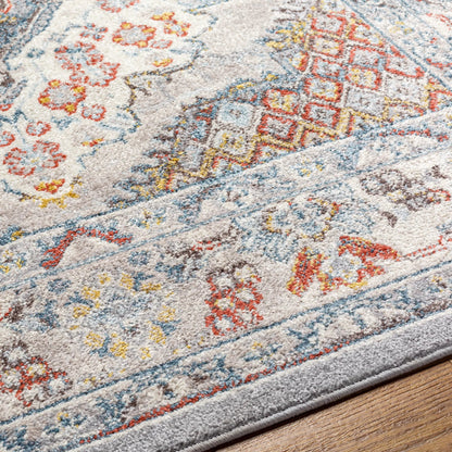 Ankara Rug by Livabliss in gray, taupe, ice blue, dark blue, cream, rust. Made from polypropylene in a unique style.