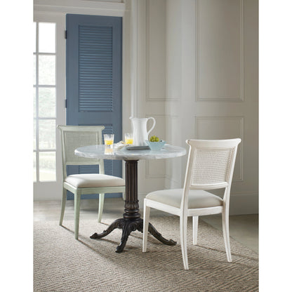 Charleston Bistro Table by Hooker Furniture in garden gate black. Made from resin with veneered carrara stone in a modern style.