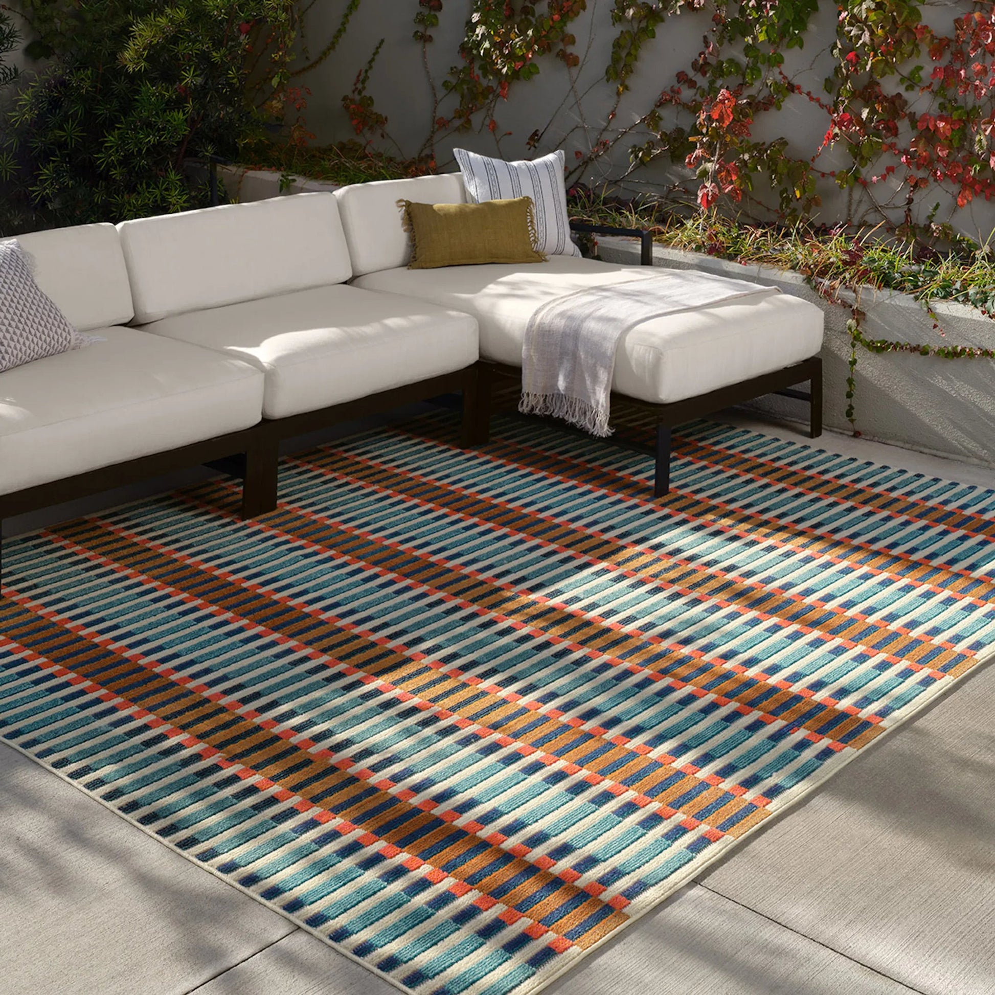 Alina ALI03 Rug by Jaipur Living in blue, orange, beige. Made from 100% polypropylene in a unique style.