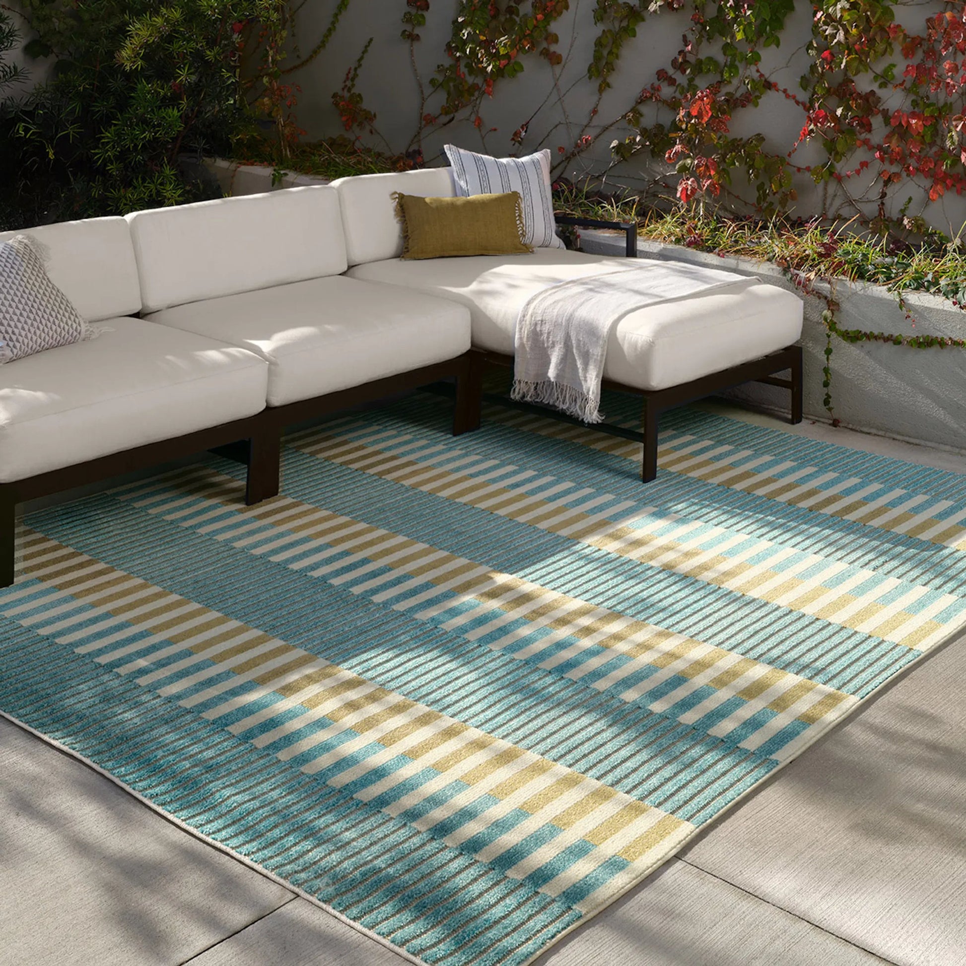 Alina ALI04 Rug by Jaipur Living in blue, yellow, beige. Made from 100% polypropylene in a unique style.
