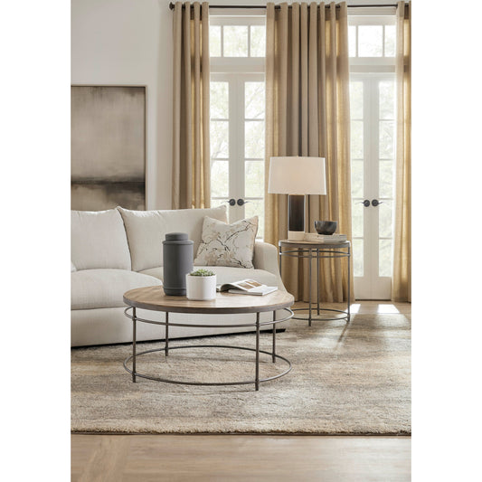 St. Armand Round Cocktail Table by Hooker Furniture in natural, antique bronze. Made from acacia solids, metal in a modern style.