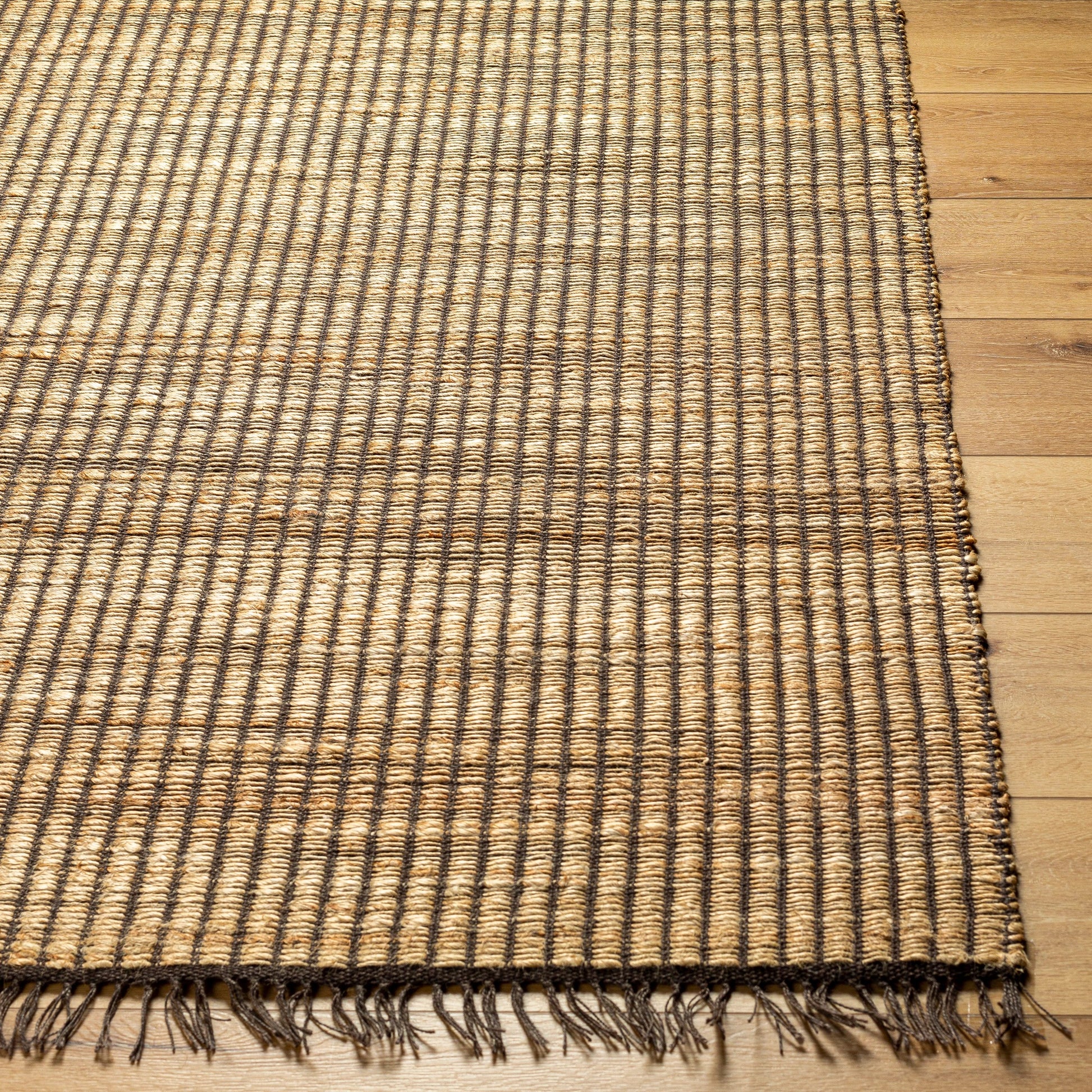 Alex Rug - 496078 by Livabliss in taupe, sandstone, charcoal, wheat, umber. Made from face: 100% jute, warp: 100% jute in a unique style.