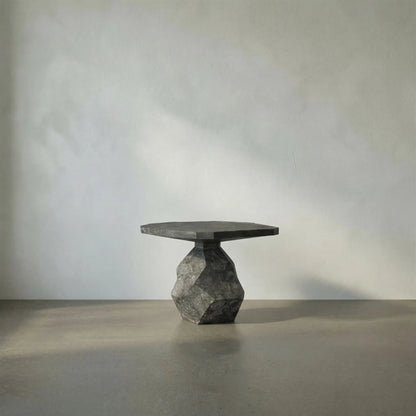 Rind Table by Noir. Made from marble in a rustic style.