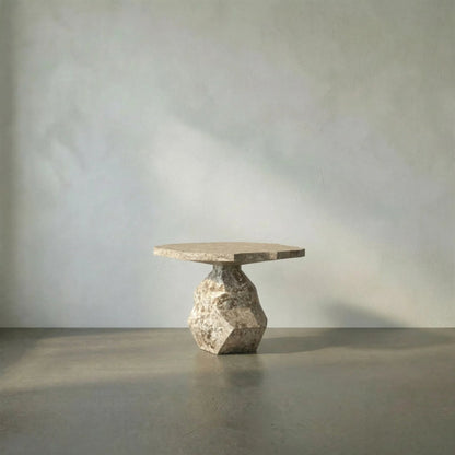 Rind Table by Noir. Made from marble in a rustic style.
