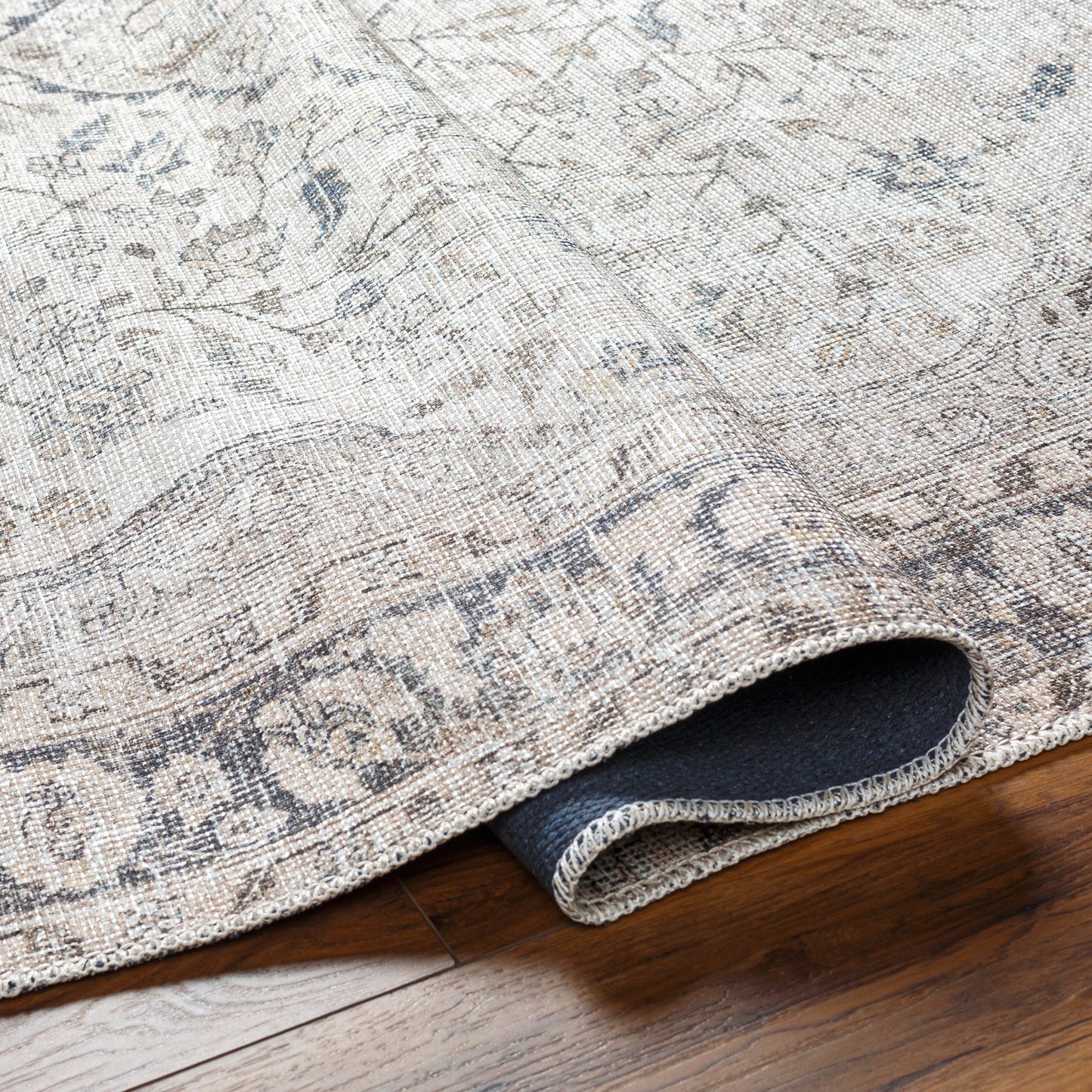 003 SI-1948657,SI-1948659,SI-1948660,SI-1948661,SI-1948662 | Closeup | Amelie Rug - 32924 by Livabliss in ivory, taupe, black, tan, navy, cream. Made from main: 50% chenille-polyester, main: 50% polyester in a unique style.