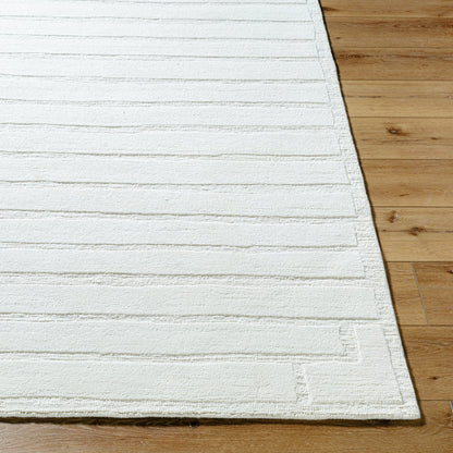 Amani AMM-2300 Rug by Surya in cream. Made from wool in a unique style.