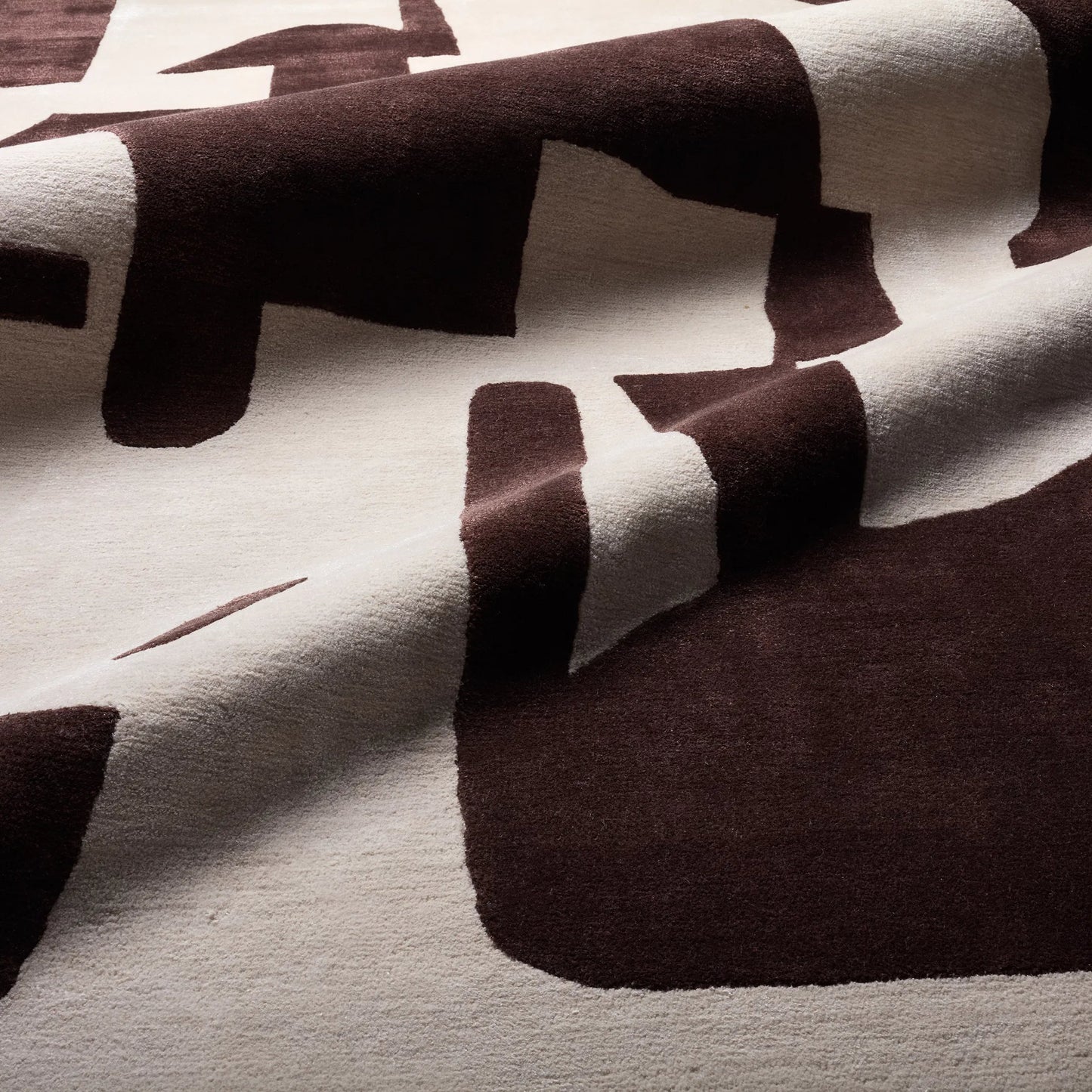 006 SI-2444615,SI-2444616,SI-2444617,SI-2444618,SI-2444619 | Closeup | Anthem ANT04 Rug by Jaipur Living in brown, cream. Made from 60% wool 20% cotton 20% viscose in a unique style.