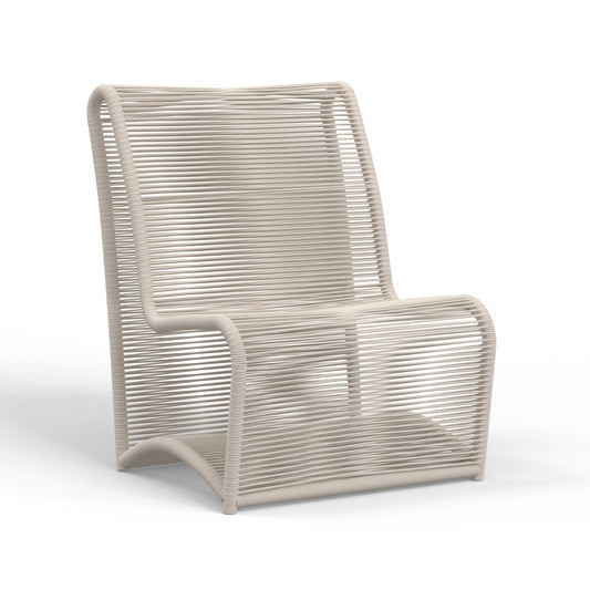 Sand Outdoor Armless Club Chair by Sunset West in sand. Made from powder coated aluminum in a coastal style.