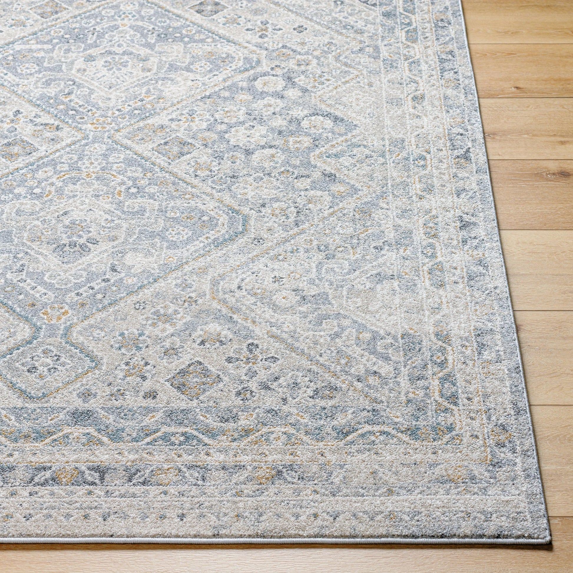 Alpharetta APH-2311 Rug by Livabliss in light beige, medium gray, cream, blue, amber, charcoal. Made from polypropylene in a unique style.