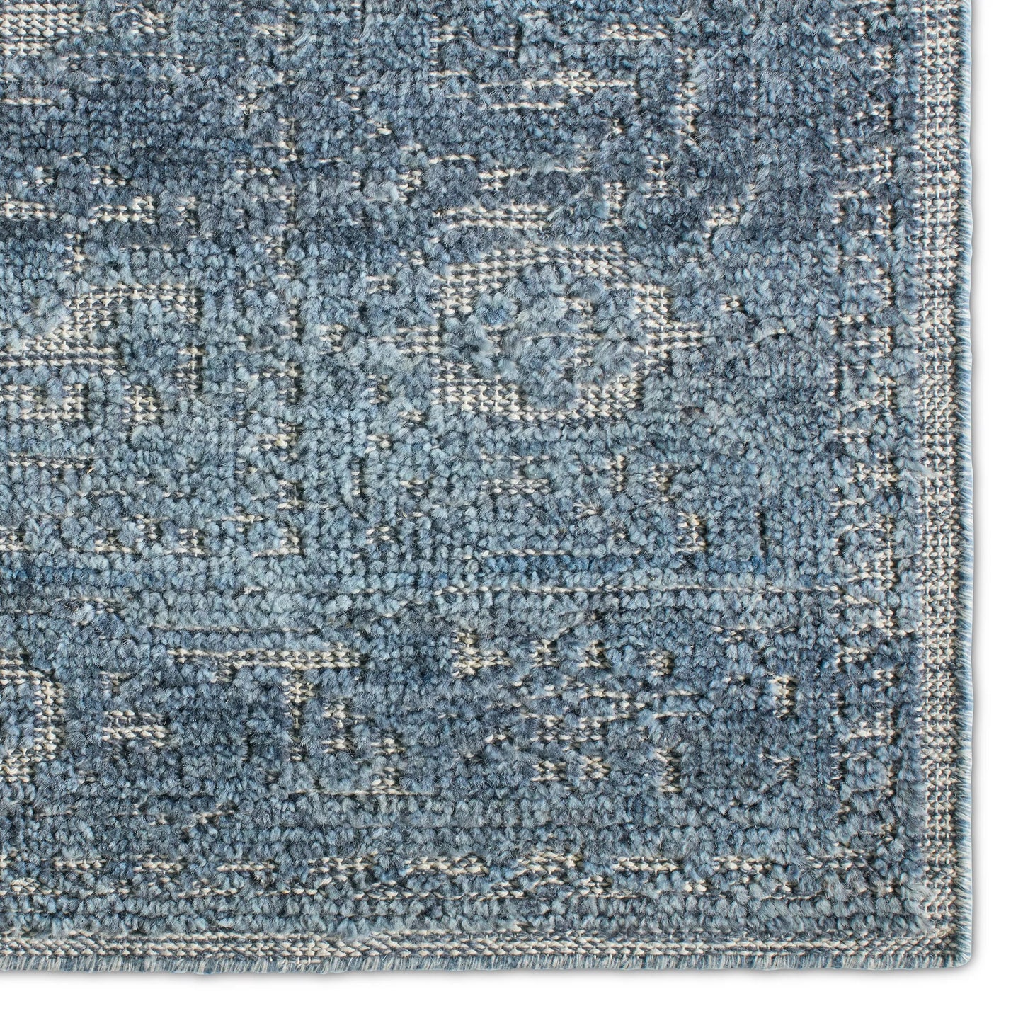003 SI-2531238,SI-2531239,SI-2531240,SI-2531241,SI-2531242,SI-2531243 | Closeup | Aposio APS03 Rug by Jaipur Living in blue. Made from 100% wool in a unique style.