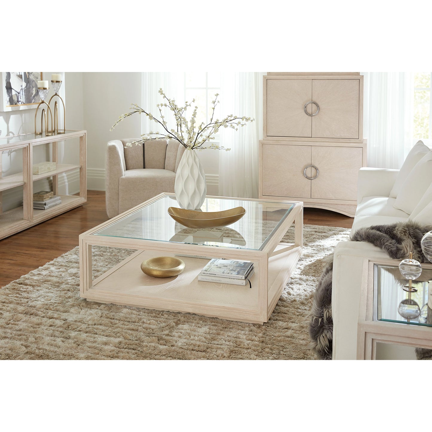 002 SI-2028941 | Lifestyle | Nouveau Chic Rectangle Cocktail Table by Hooker Furniture in sandstone. Made from oak veneers, tempered glass, metal in a modern style.