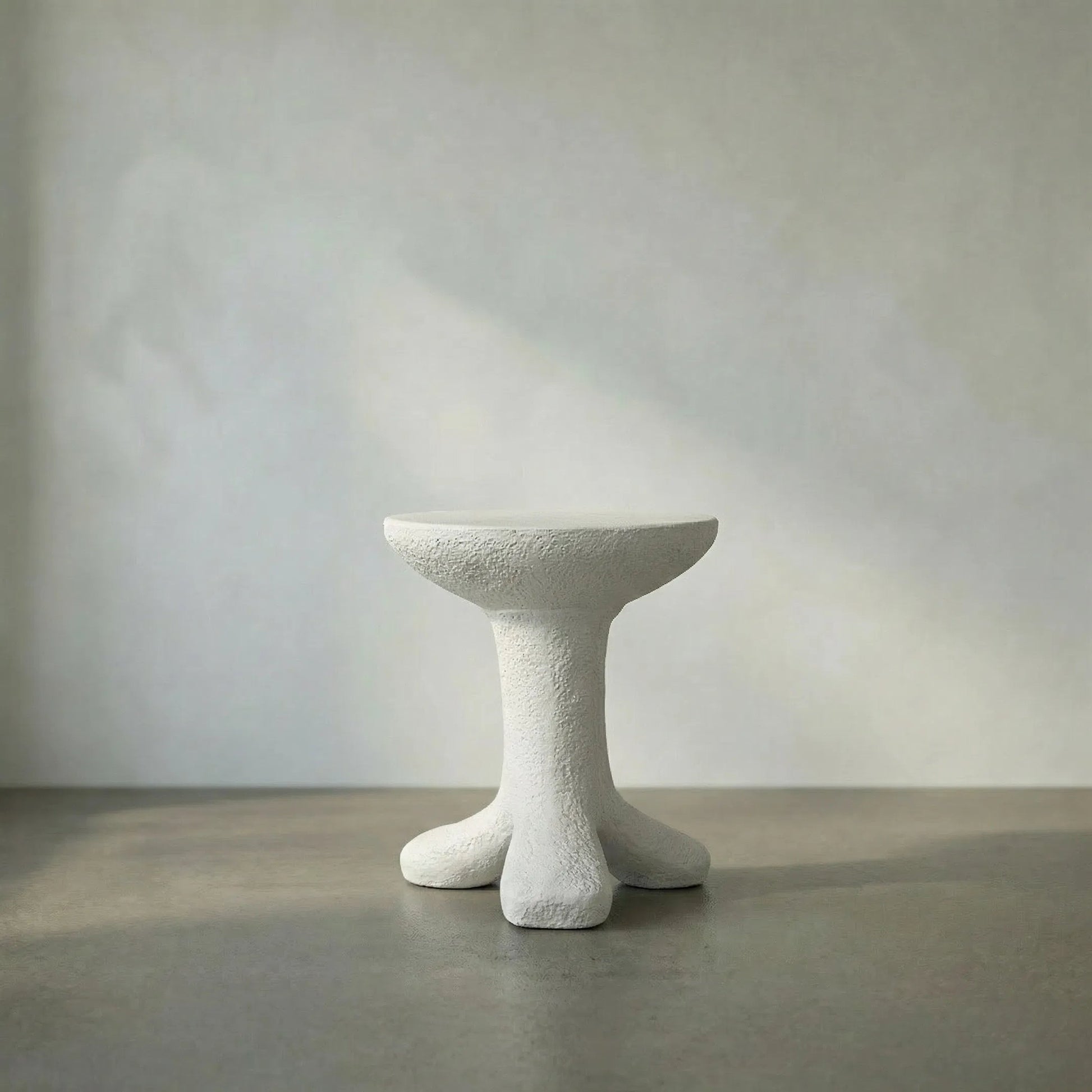 Laramy Side Table by Noir in white. Made from fiber cement in a modern style.