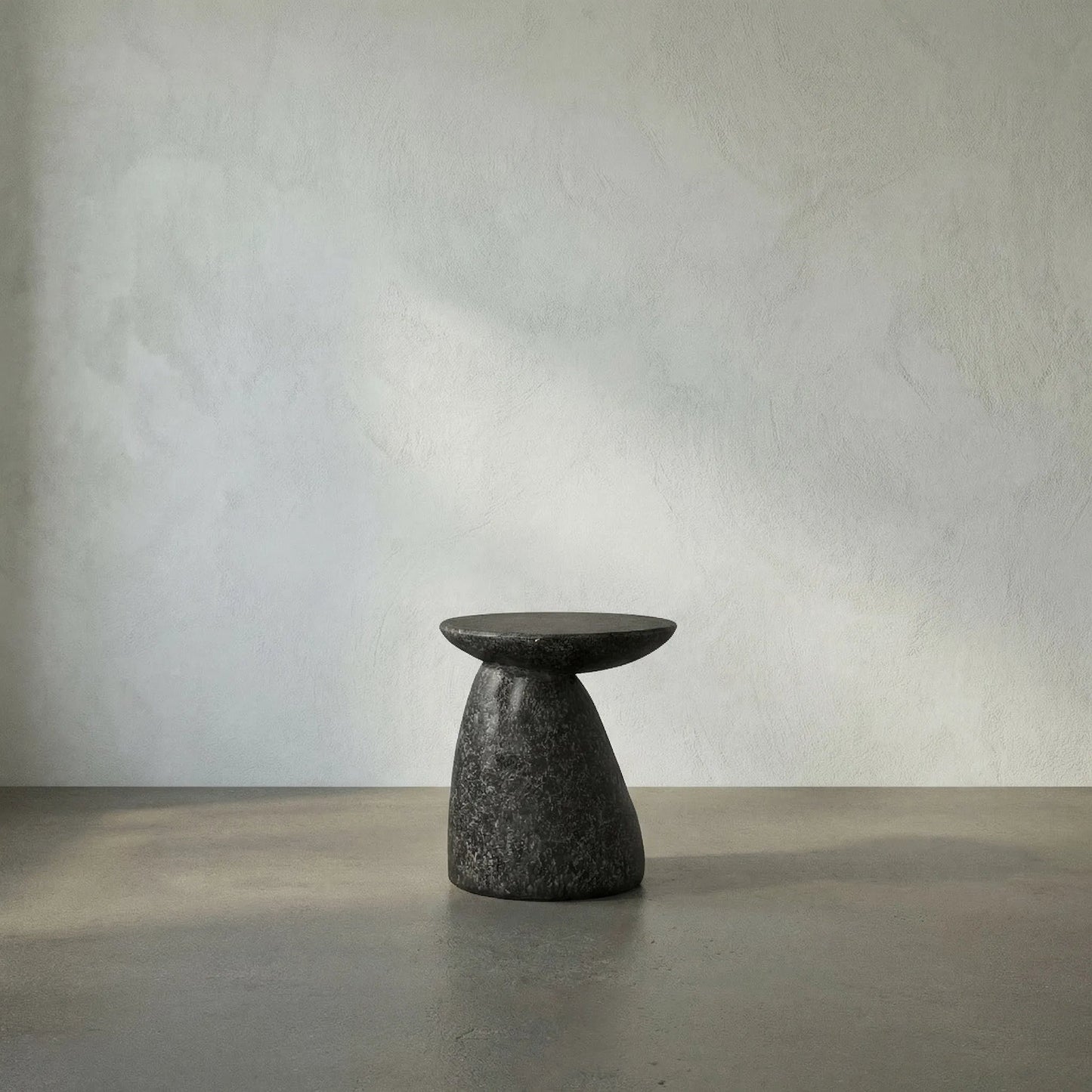 012 SI-1975477 | Lifestyle | Kurokawa Side Table by Noir in black fiber cement. Made from fiber cement in a modern style.