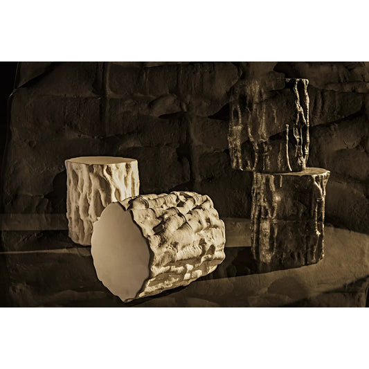 Damono Side Table by Noir. Made from fiber cement in a rustic style.