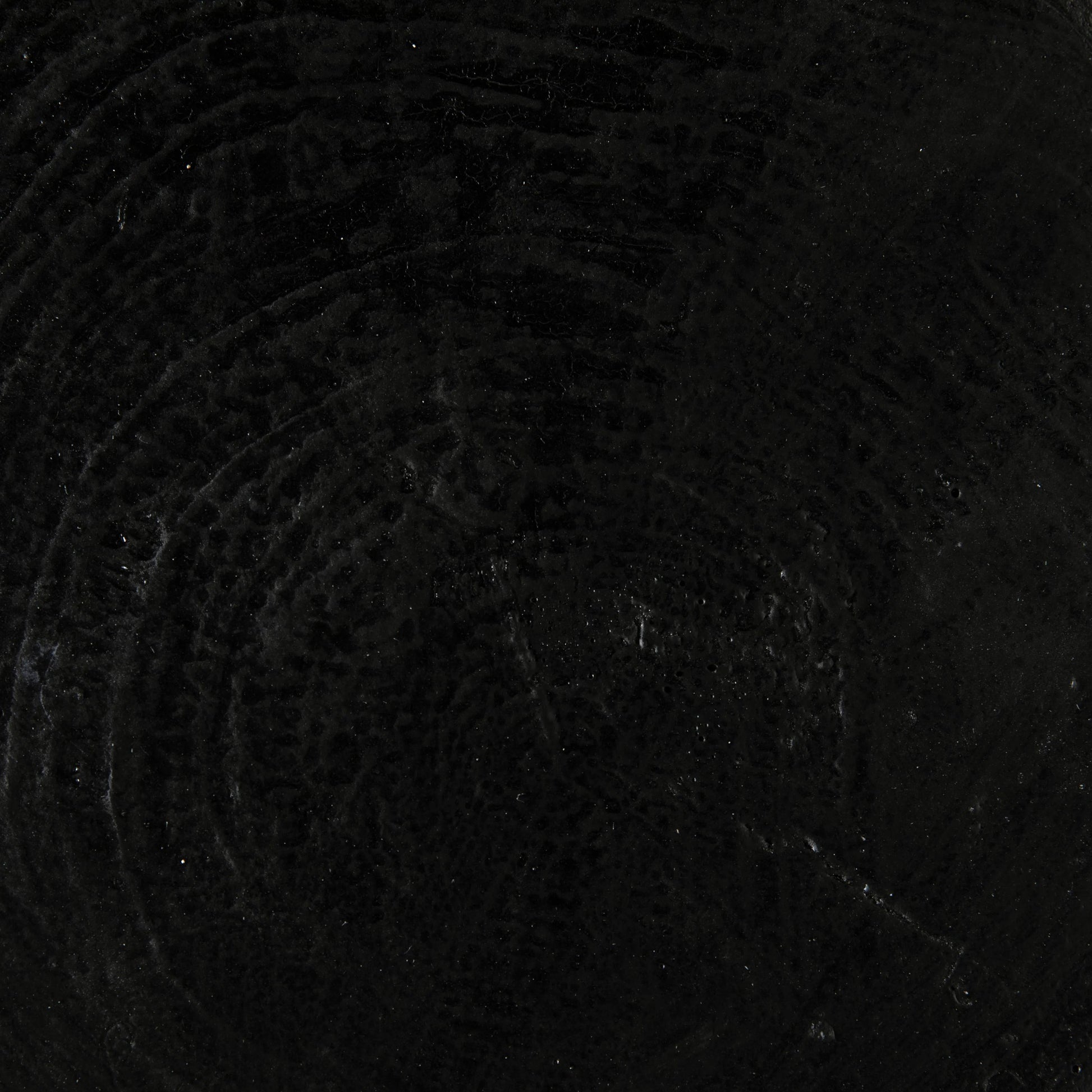 Samson Stool/Side Table by Noir in black burnt fiber cement. Made from fiber cement in a transitional style.