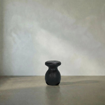 Samson Stool/Side Table by Noir in black burnt fiber cement. Made from fiber cement in a transitional style.