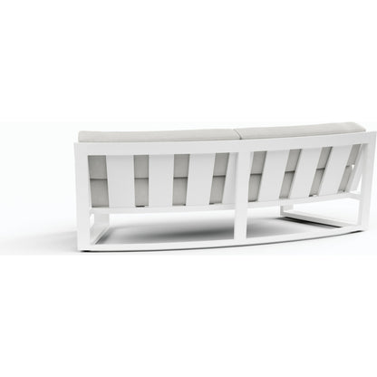 Newport Outdoor Curved Sofa by Sunset West in frost. Made from aluminum in a modern style.