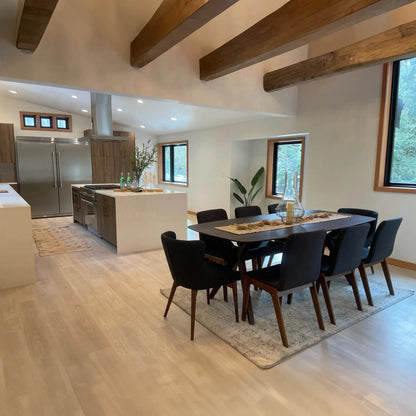 Arcadia Dining Table by LH Imports in brown and light walnut. Made from mango hardwood in a modern style.