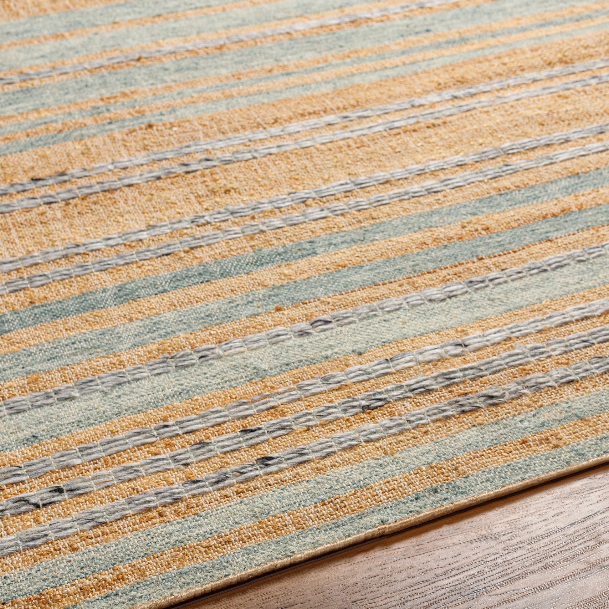 Arielle Rug - 26079 by Surya in tan, ink blue, slate, seafoam, sage. Made from 55% wool, 45% jute in a unique style.